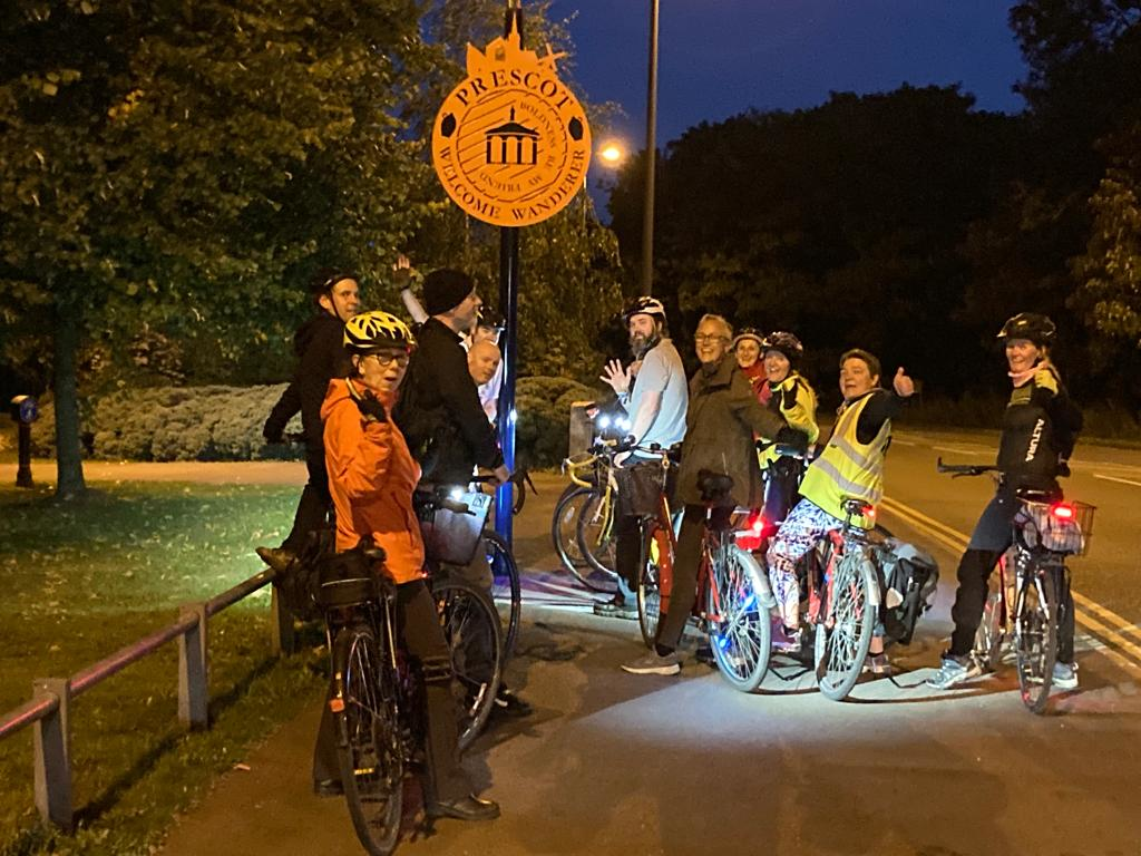 Friday night cycle group, folks riding bikes