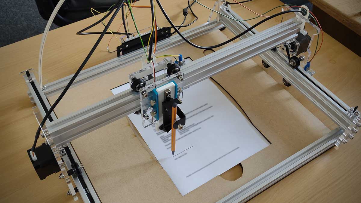 A CNC plotter made with a shiny aluminum extrusion frame, with a pen-mount over a piece of A4 paper.